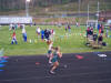 Sarah Owenby and Julie Osboren (foreground) finish of Conference Championship 300M Hurdles